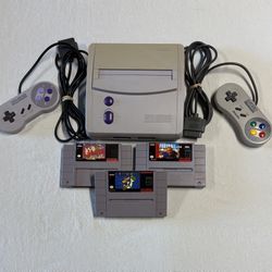 Super Nintendo w/ Super Mario World, Controllers + More!