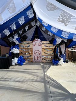 Draping canopy tables chairs balloons garland backdrop cielito lindo graduation