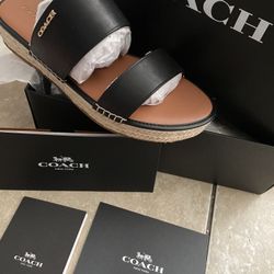 Coach women’s Size (8.5)
