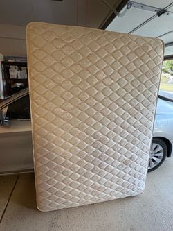 Full size bed with maple headboard and footboard