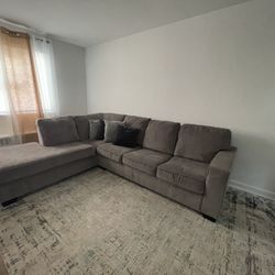 L Shaped couch With Bed