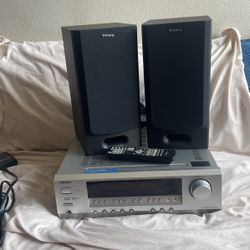 Onkyo Receiver And Two Sony Speakers
