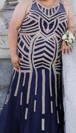 Formal Gown Royal Blue with Gold Bling size 3x. Back is corset only used once. We paid $380 letting go for cheap. Make a reasonable offer