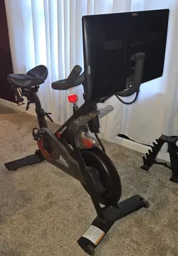 3rd Generation Peloton Exercise Bike with Touchscreen Console, Extra Seat, Weights