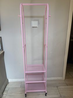 Pink garment/clothing rack