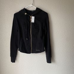 Brand new woman’s Bebe brand black jacket up for sale 