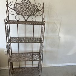 Beautiful antique bronze four-tiered baker's rack or plant stand