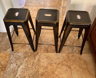 3 Black/brassy gold 24” Counter Stools