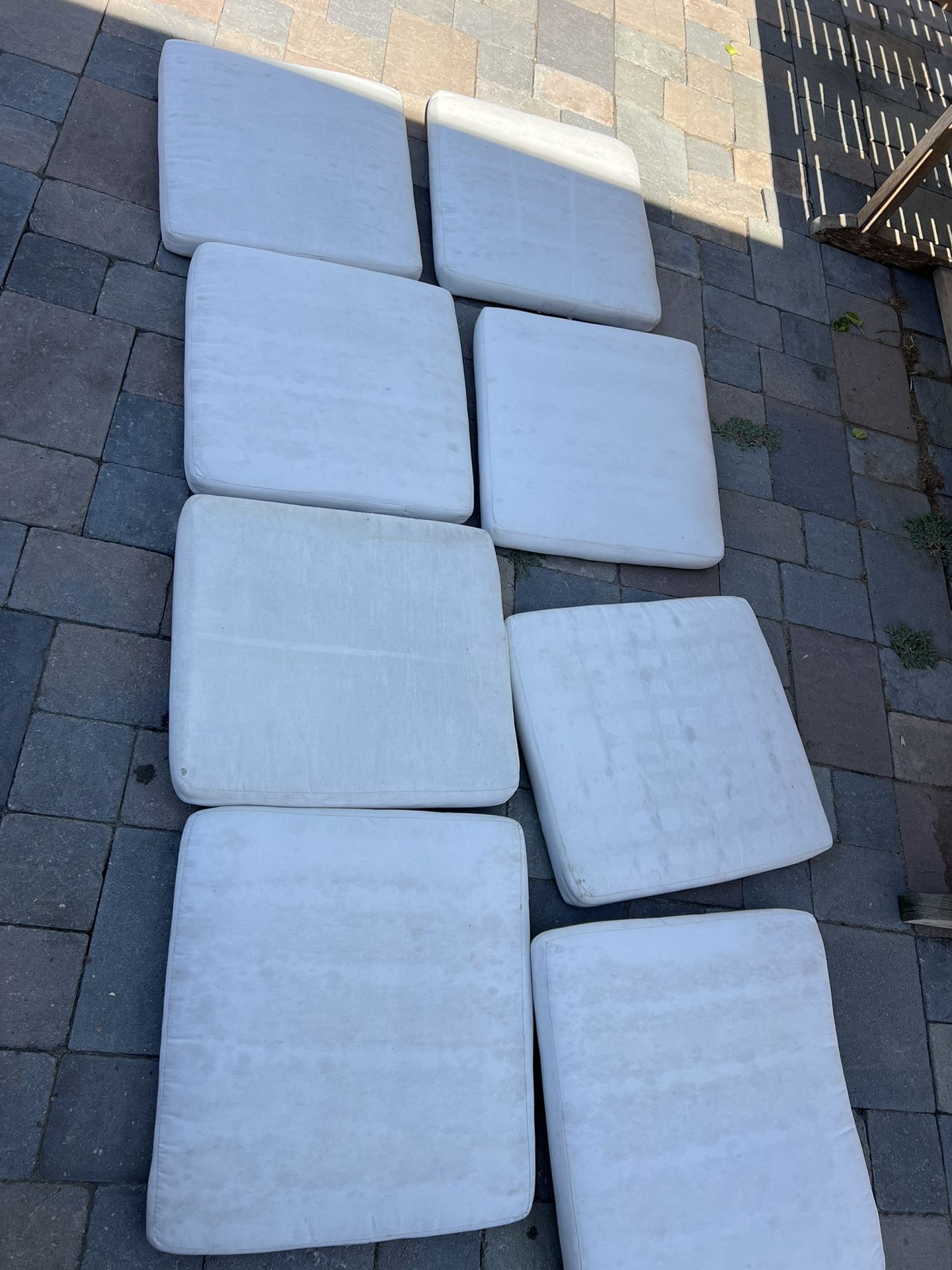 8 pieces Outdoor Patio Furniture Cushions In off white Located in concord Good condition No rips or tears Measures 20”x 21” $40 for the 8 pieces