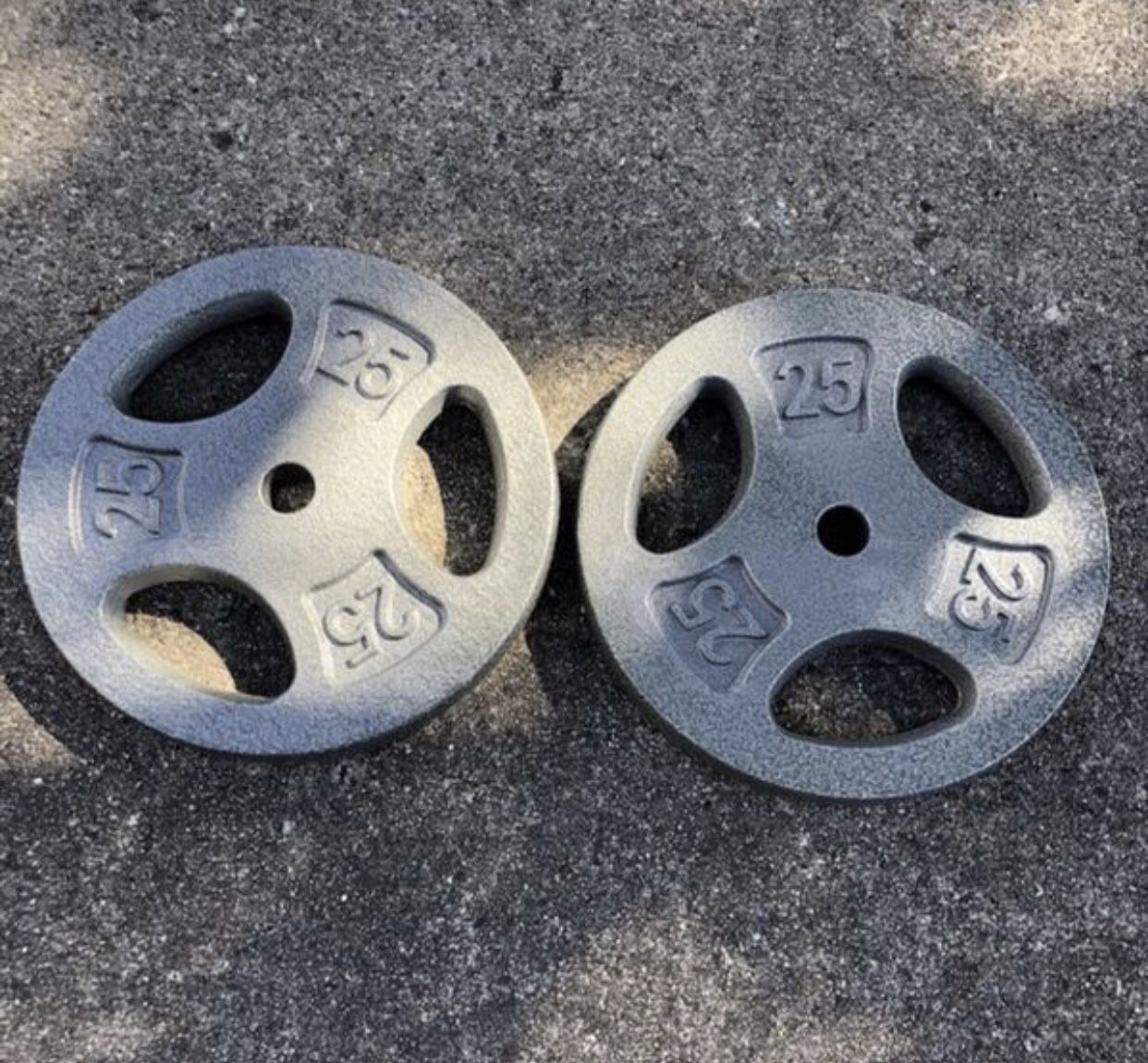 Brand new 25lb weight plates set of 2