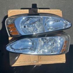 04-08 Grand Prix Headlights Faros Calaveras Micas Luces