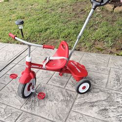 Radio Flyer Deluxe Steer & Stroll Tricycle with Parent Push Handle and Adjustable Seat