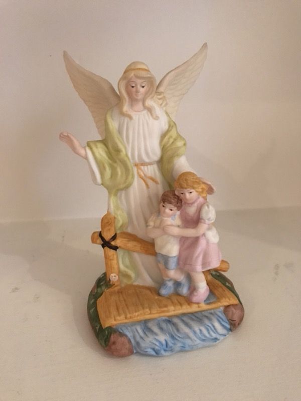 New - Angel looking over children