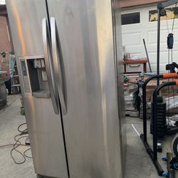 LG Stainless Steel Refrigerator Side By Side With Ice Maker 36” Wide X 69 1/2” High X 31” Deep Works Great