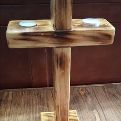 Rustic wood crosses with tea light candles