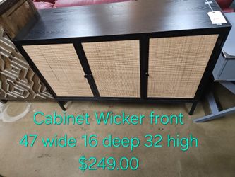 Black Sideboard Cabinet with Wicker Front Doors We are located at 2811 East Bell road. Another Time Around Furniture.
