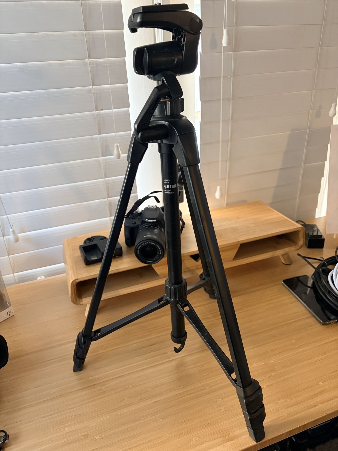 Canon EOS Rebel T6 DSLR Camera + 18-55mm Lens + Tripod Bundle