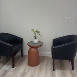 Faux leather arm chairs