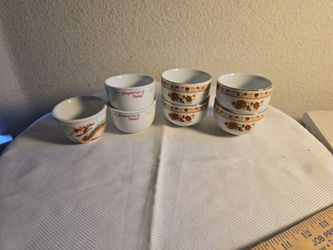 7 tea cups (4 with matching flowers 2 fr6om Emperors Table & 1 witha dragon