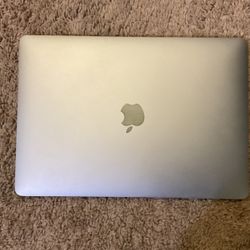 MacBook Pro Latest Model 13.3 Inch With Touch Bar Comes With Carrying Case With Value Of $90 And Adapter That Is Also An Additional $90.