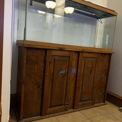 50 inch fish tank for sale. The stand comes with it.