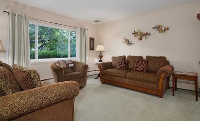 Living room sofa and love seat; optional round tables and swivel round rocker.