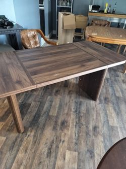 Roesler Brown Wood 62 in Rectangle Dining table