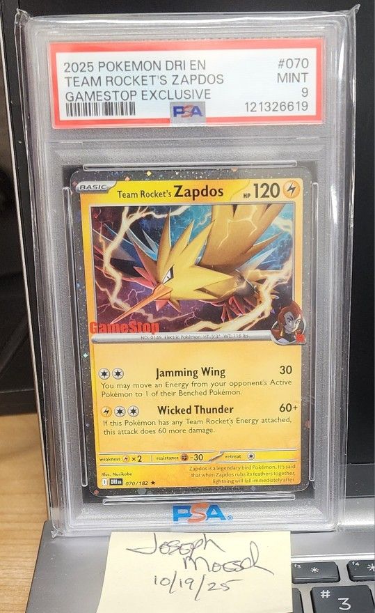 FOR SALE / NFT - PSA 9 - 2025 POKEMON ZAPDOS  TEAM ROCKET'S  GAMESTOP EXCLUSIVE #70