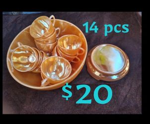 MUST SELL ASAP!!!

14 Piece Set of Vintage Carnival Iridescent Glass, Depression Glass, Jeannette Marigold Tea/Coffee/Party/Punch Bowl + Base + Cups