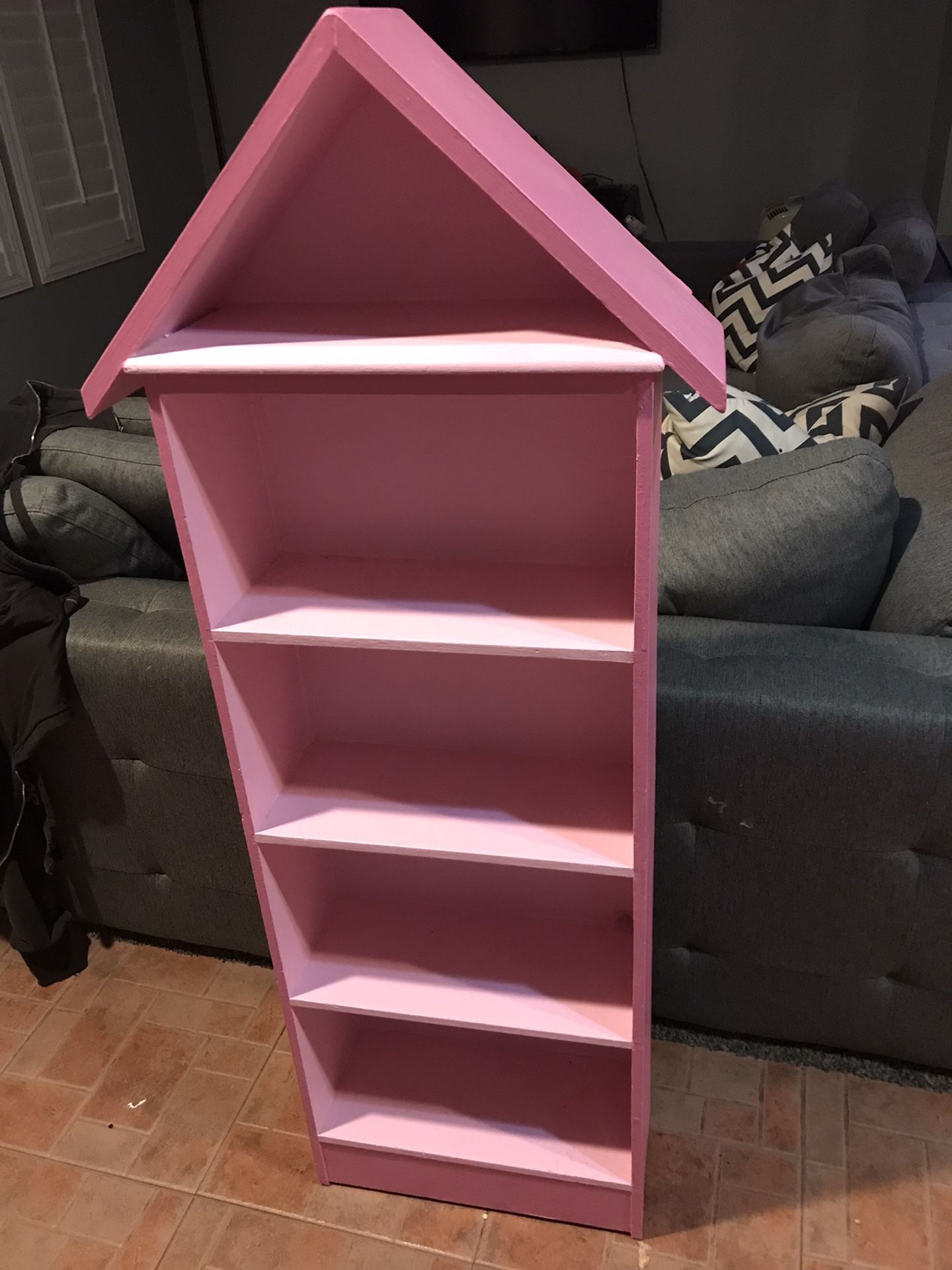 Pink dollhouse shelf