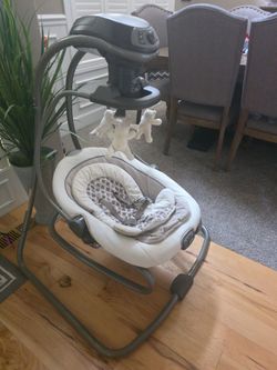 Grey and White baby swing
