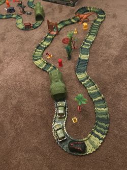 Lg and Small dinosaur tracks and car and trucks all work