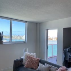 American Signature Modern Tufted Gray Velvet Sofa with Blush Accent Pillows