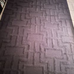 black area rug with designs 