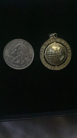 The world is yours pendant