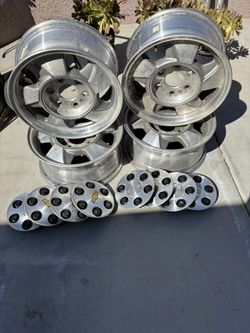 2005 Chevy Wheels & 2 Set Of Hubcaps 
