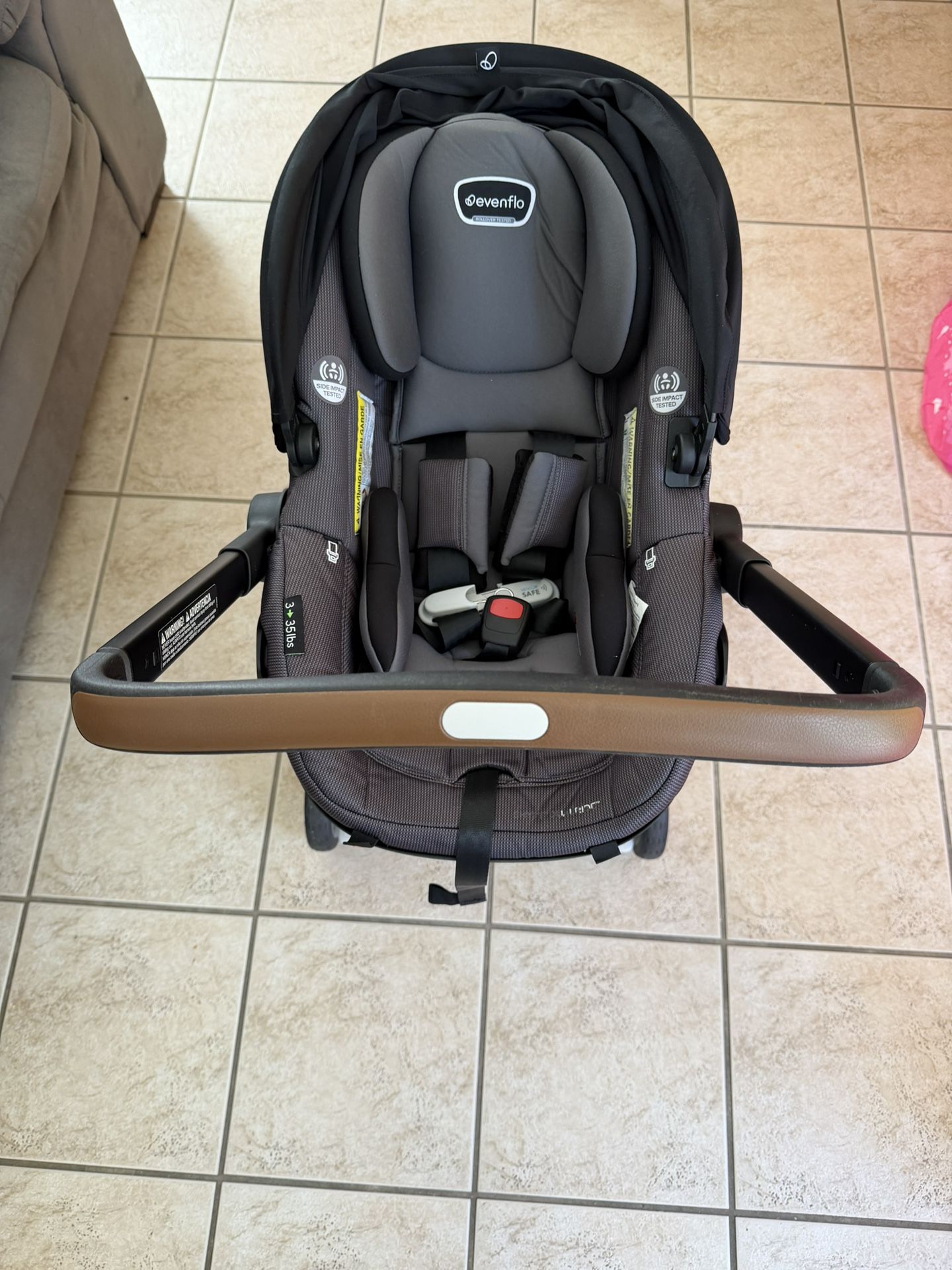 Evenflo Shyft DualRide Infant Car Seat and Stroller Combo w/Carryall Storage