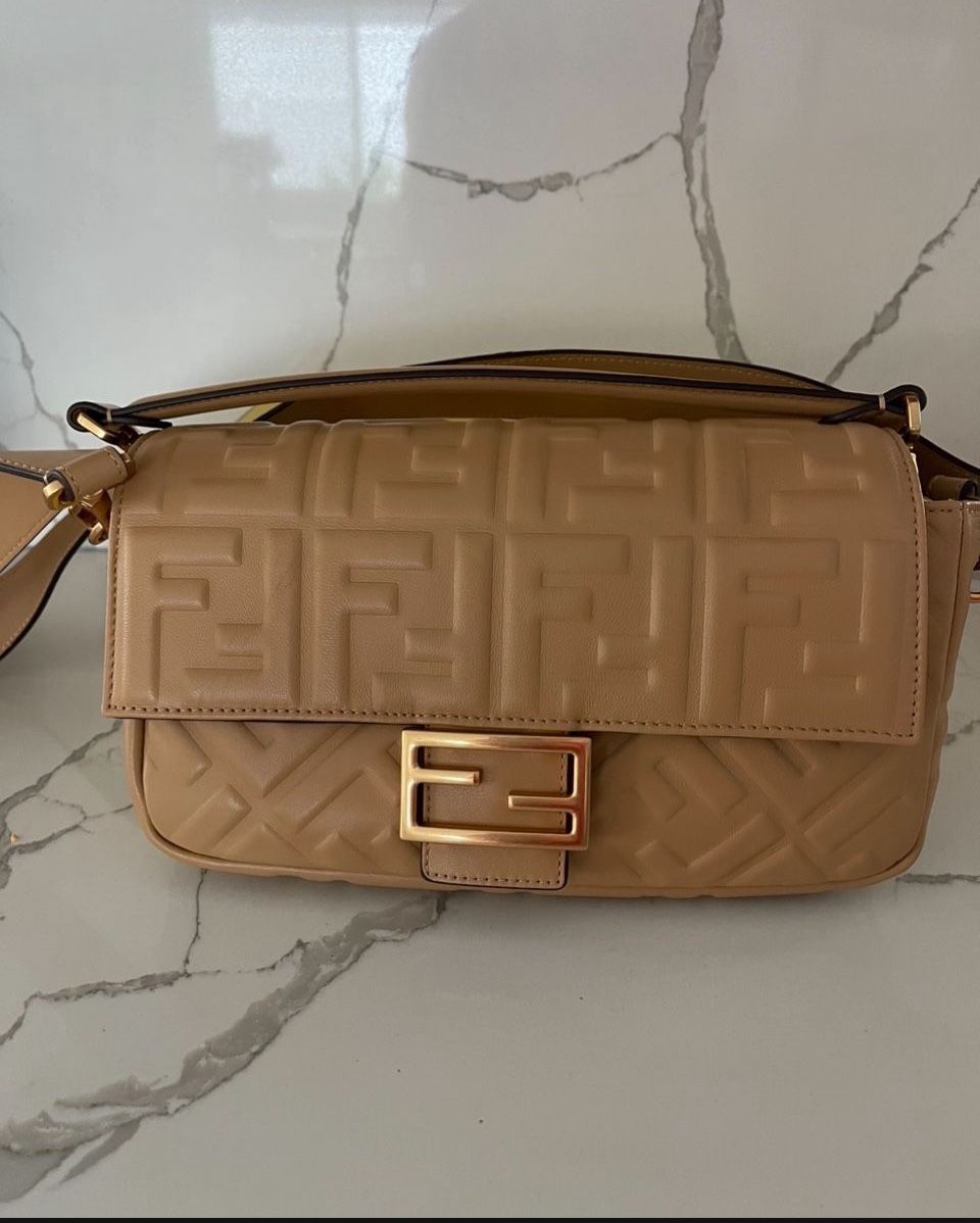 Baguette bag in like new condition. Comes with box and dust bag