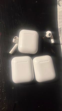 Three AirPod cases with AirPods only one missing plus extra