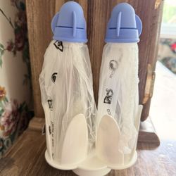 Tupperware, salt and pepper, shakers and holder