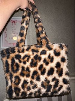 Cheetah purse ñ.