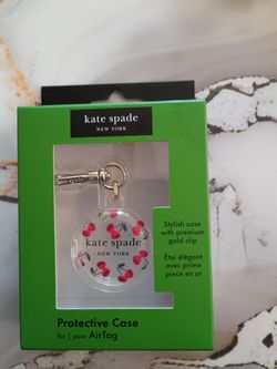 Kate Spade New York 
cherry dot AirTag key chain charm