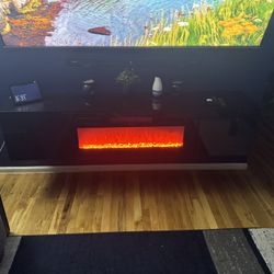 Wall-Mounted Modern LED Fireplace TV Stand – Excellent Condition 