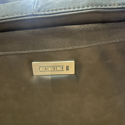 Genuine leather love seat recliner.