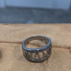 N A N A WIDE BAND SILVER RING