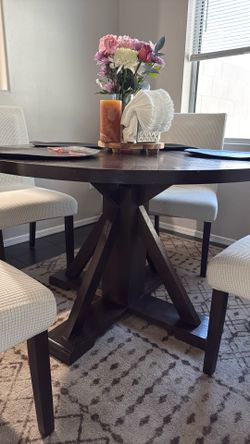Round dining table with chairs