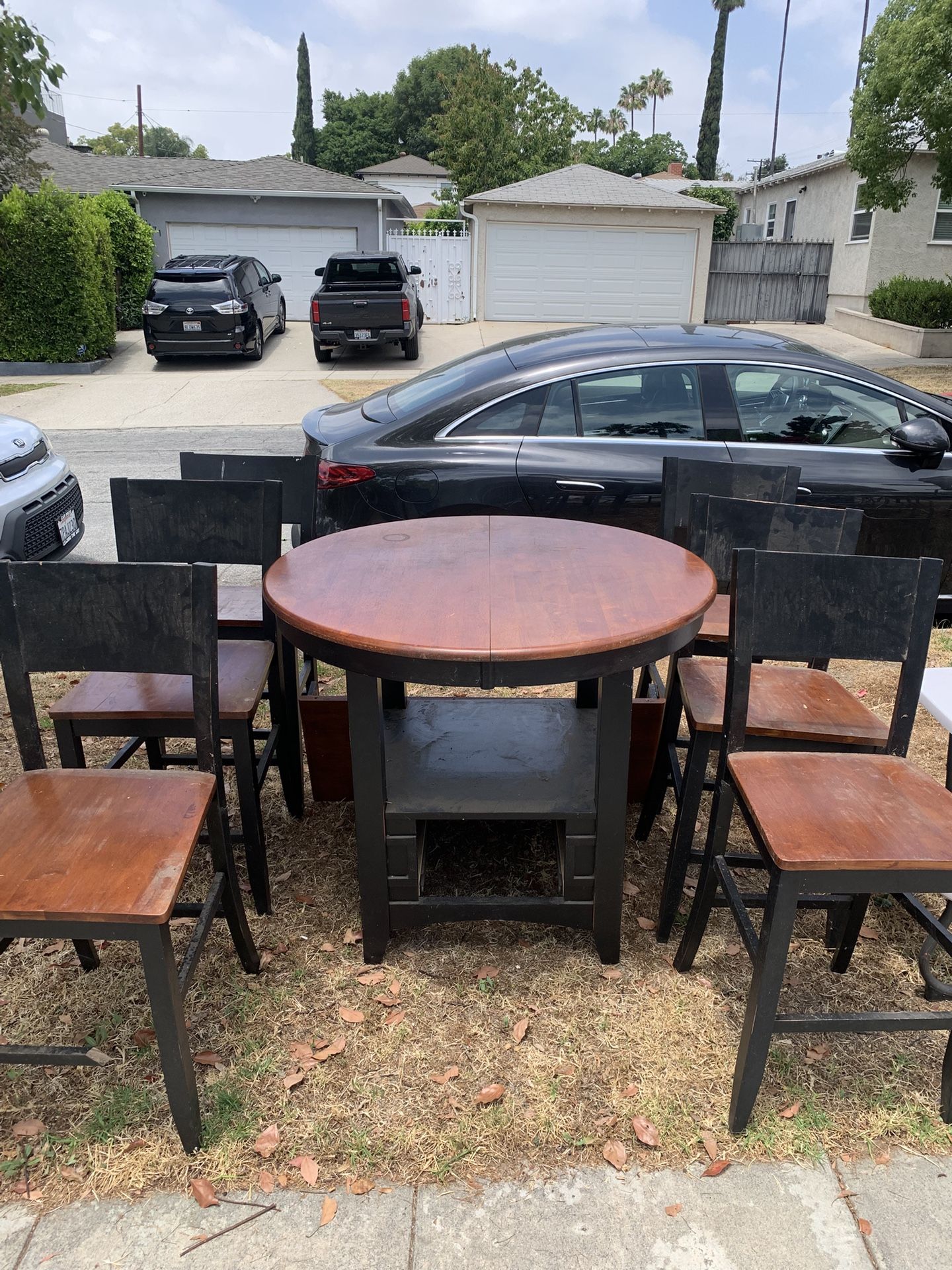 Great!! Barely Used! High Table Includes Six (6) Chairs!