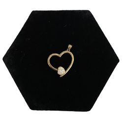 Gold heart with diamond accent pendant