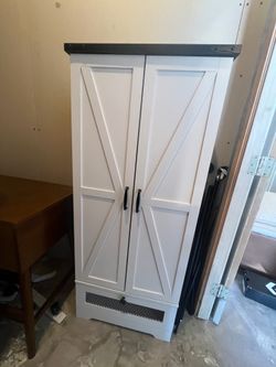 White barn door storage cabinet with drawer