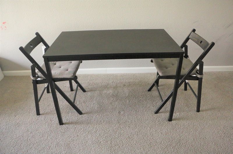 Dining table with two chair and cushion